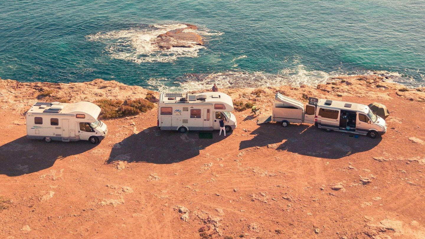 Stressed RV owner waiting roadside before mobile repair service arrives